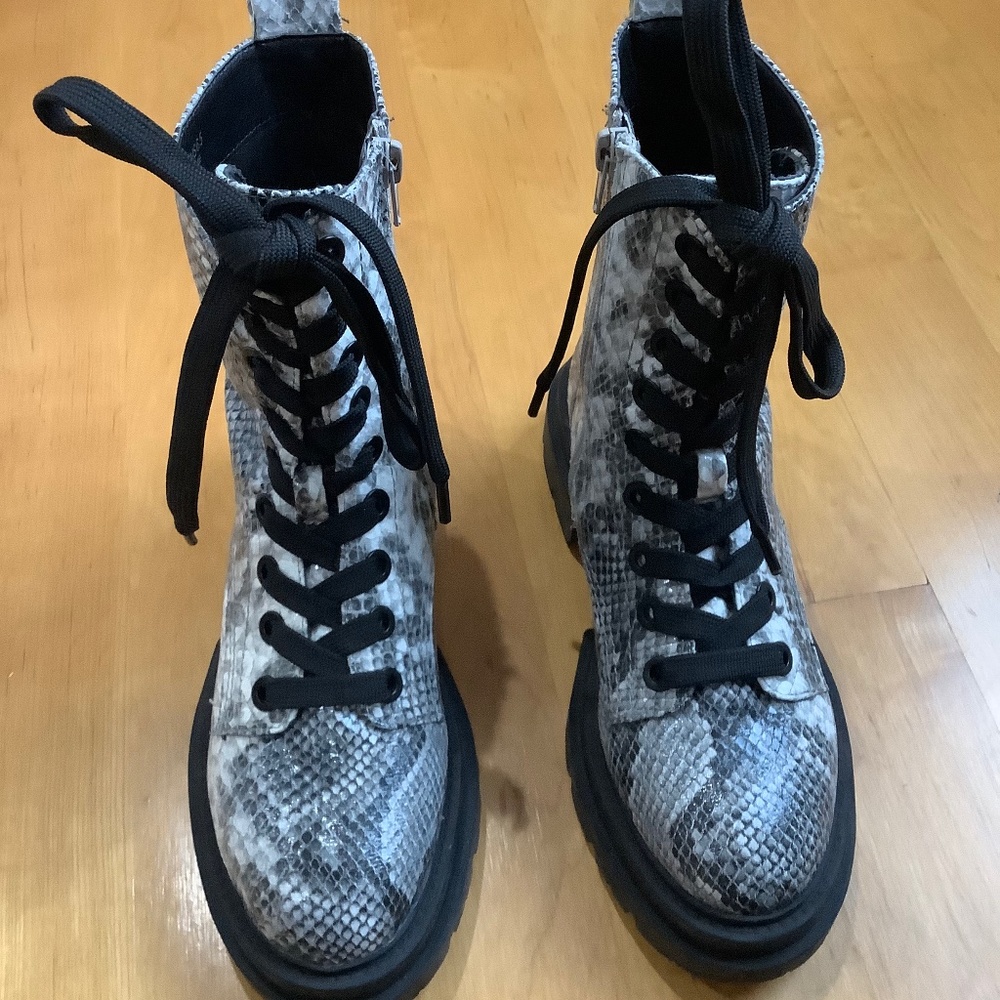 Cool Dolce Vita Combat boots, black/white pattern, size 6.5